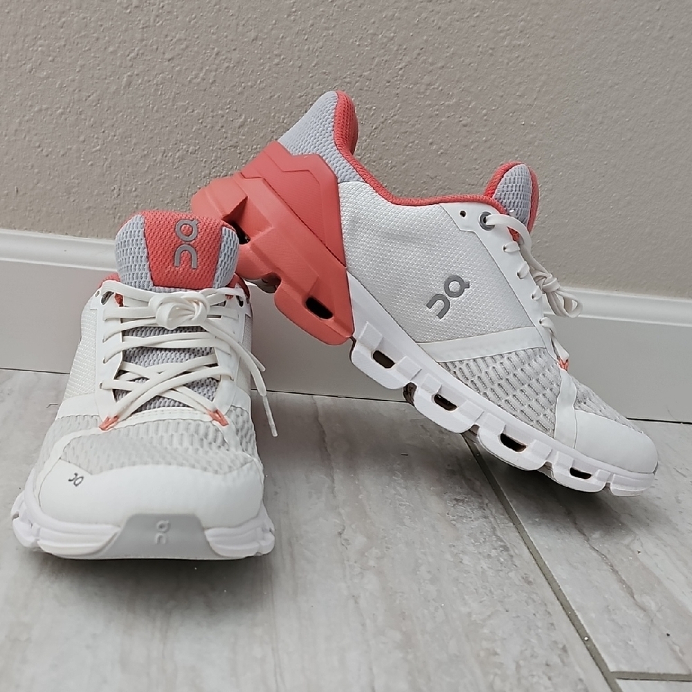 On Running White and Pink Sneakers with Cloud Cushioning Cloudflyer